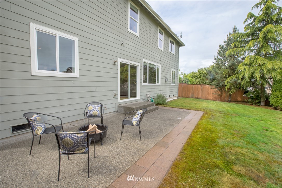 4407 219th Street Southeast Bothell, WA 98021 - Photo 27 of 33 a view of a house with backyard and sitting area