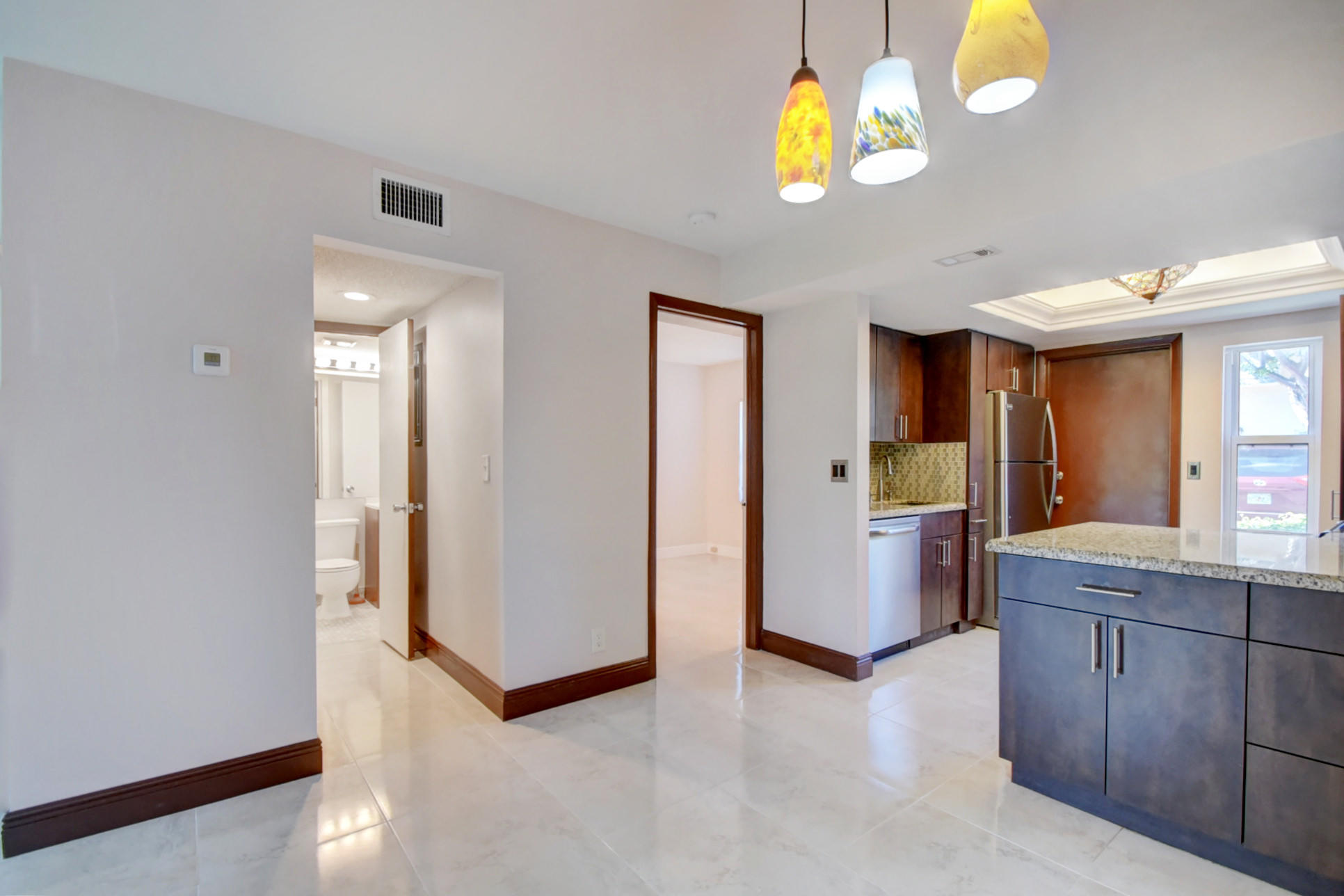1845 Northwest 4th Avenue, Unit 16 Boca Raton, FL 33432 - Photo 15 of 37 a view interior of a house and natural light