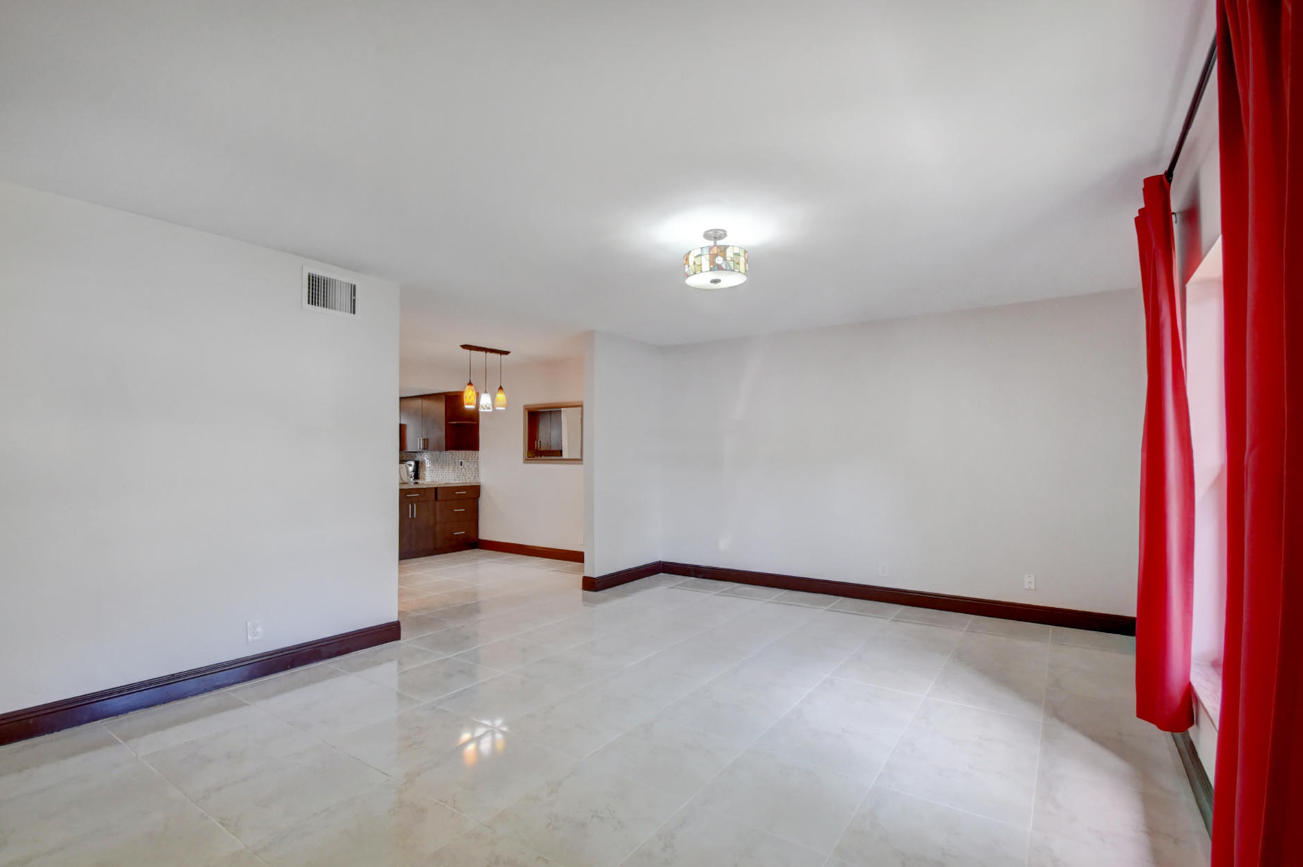 1845 Northwest 4th Avenue, Unit 16 Boca Raton, FL 33432 - Photo 37 of 37 a view of a livingroom with a staircase
