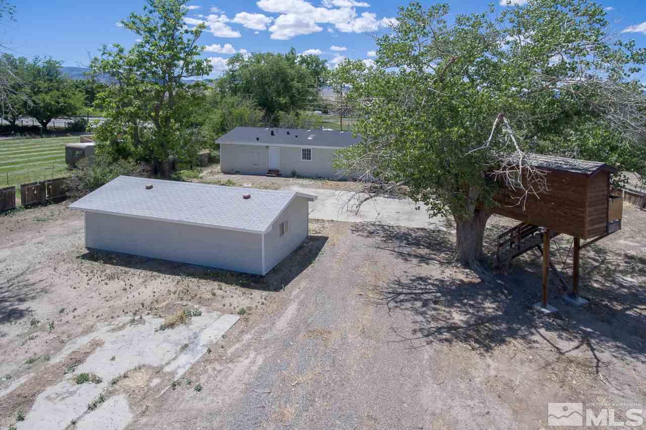 1380 Ricci Lane Fernley, NV 89408 - Photo 21 of 25 a view of a terrace with a yard