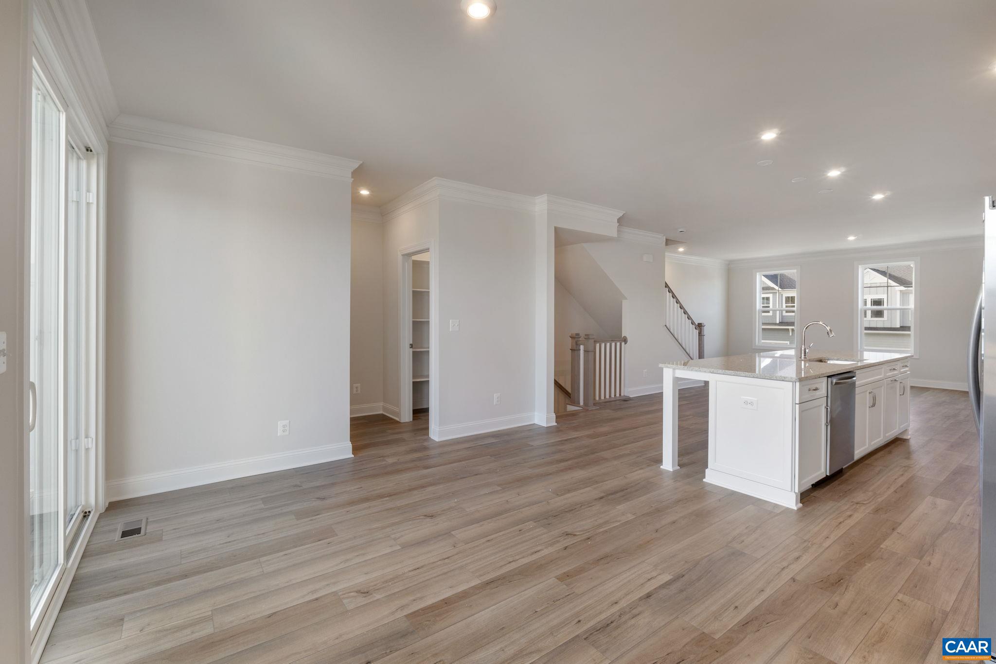 44 Marcella Street Charlottesville, VA 22911 - Photo 12 of 42 a view of a kitchen with wooden floor and electronic appliances