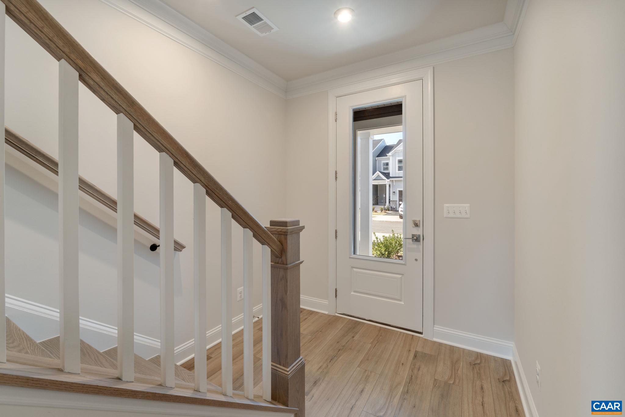 44 Marcella Street Charlottesville, VA 22911 - Photo 3 of 42 a view of an entryway with wooden floor and door