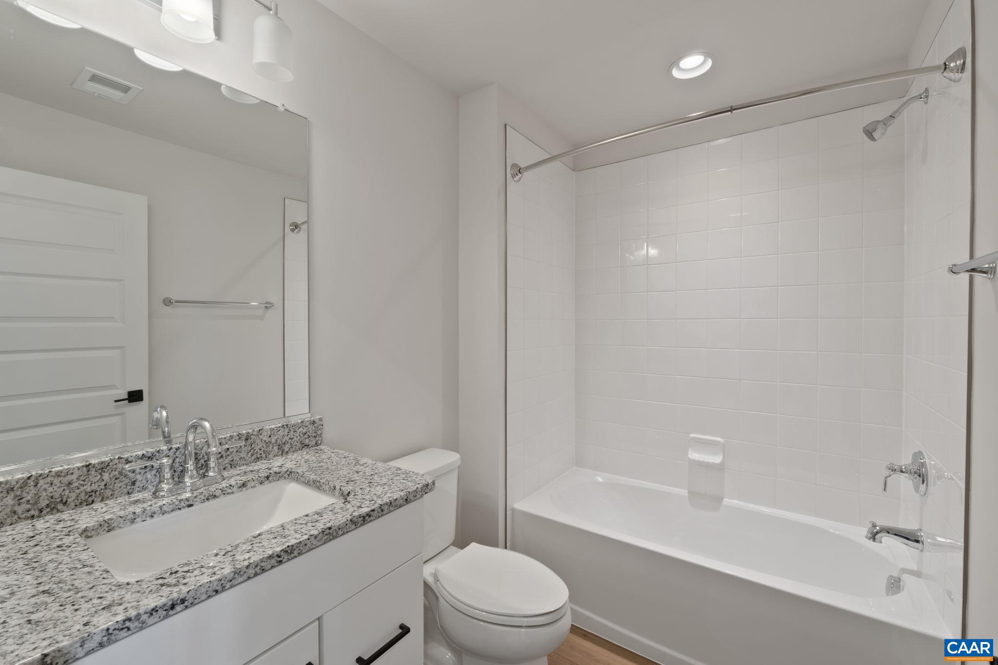 44 Marcella Street Charlottesville, VA 22911 - Photo 6 of 42 a bathroom with a granite countertop sink toilet and shower