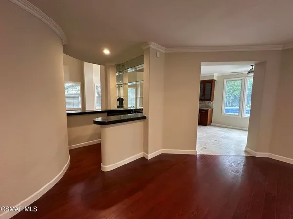 a view of a kitchen with a sink and a stove