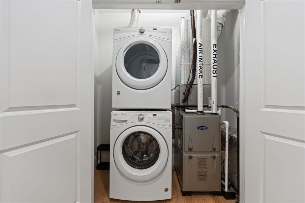 142 Pleasant Street, Unit 2 Winthrop, MA 02152 - Photo 12 of 14 a utility room with dryer and washer