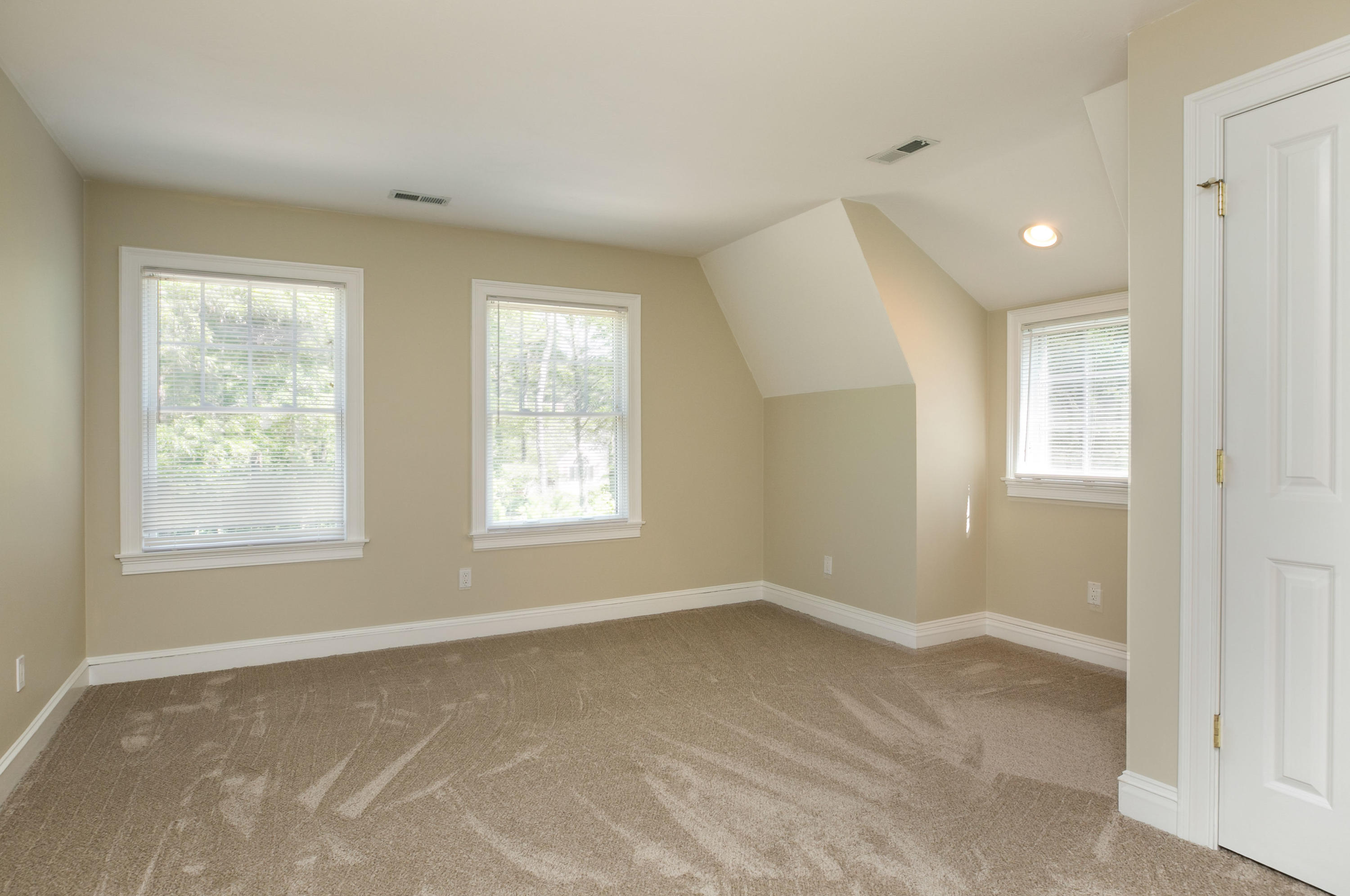 334 Waquoit Road Cotuit, MA 02635 - Photo 12 of 32 a view of an empty room with a window