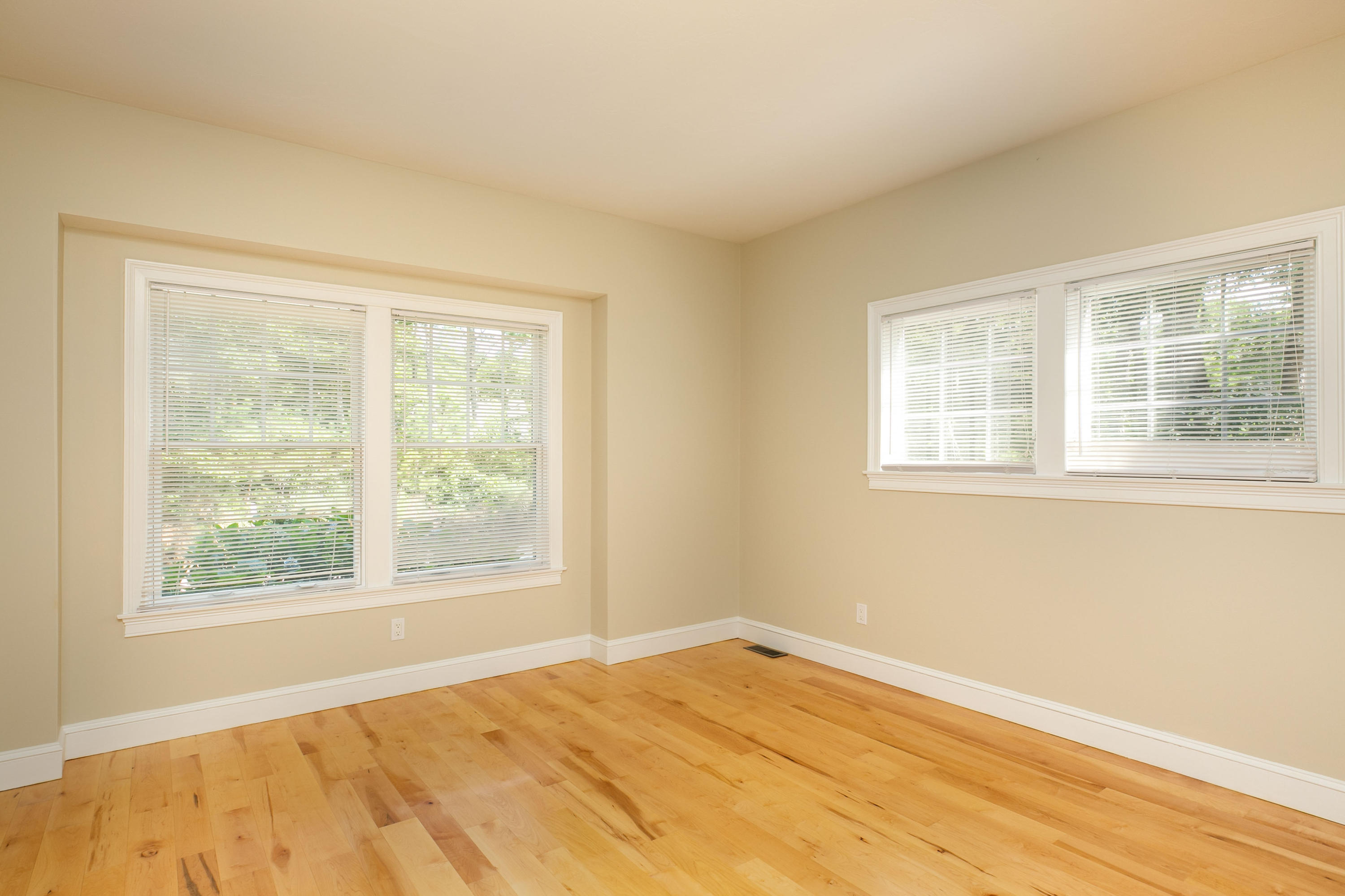 334 Waquoit Road Cotuit, MA 02635 - Photo 8 of 32 a view of an empty room with wooden floor and a window