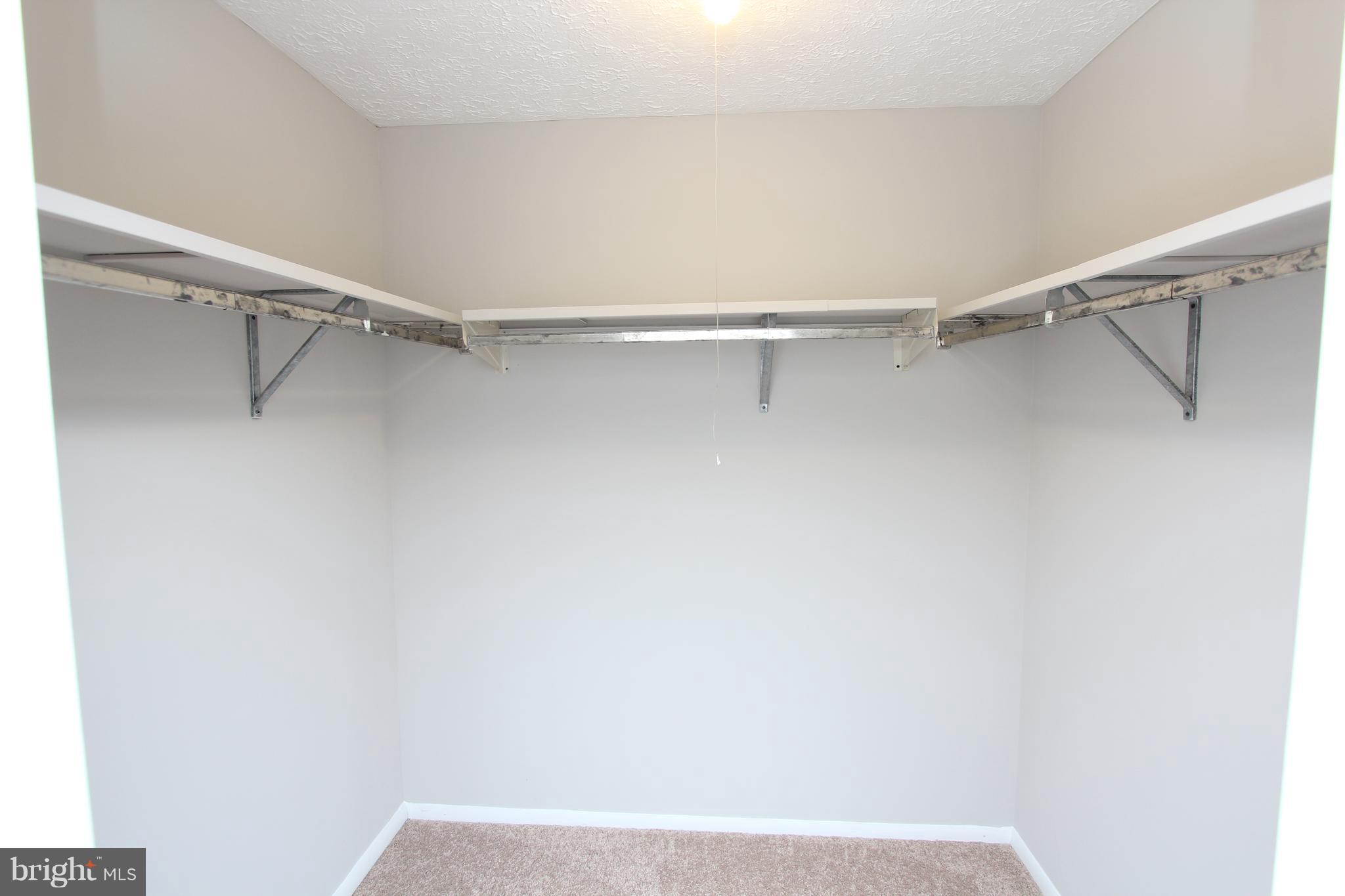 8757 Newington Commons Road Lorton, VA 22079 - Photo 11 of 20 a view of an empty walk in closet