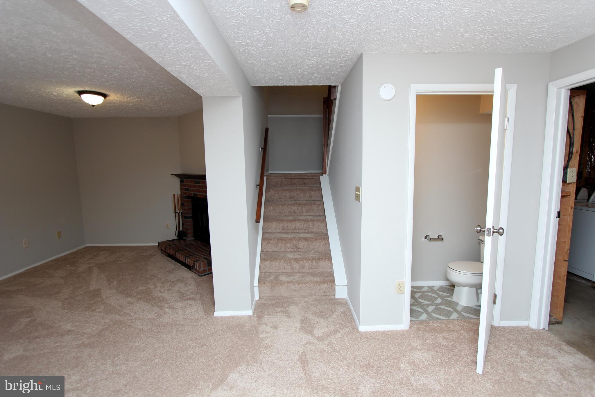 8757 Newington Commons Road Lorton, VA 22079 - Photo 17 of 20 wooden floor and closet in a room