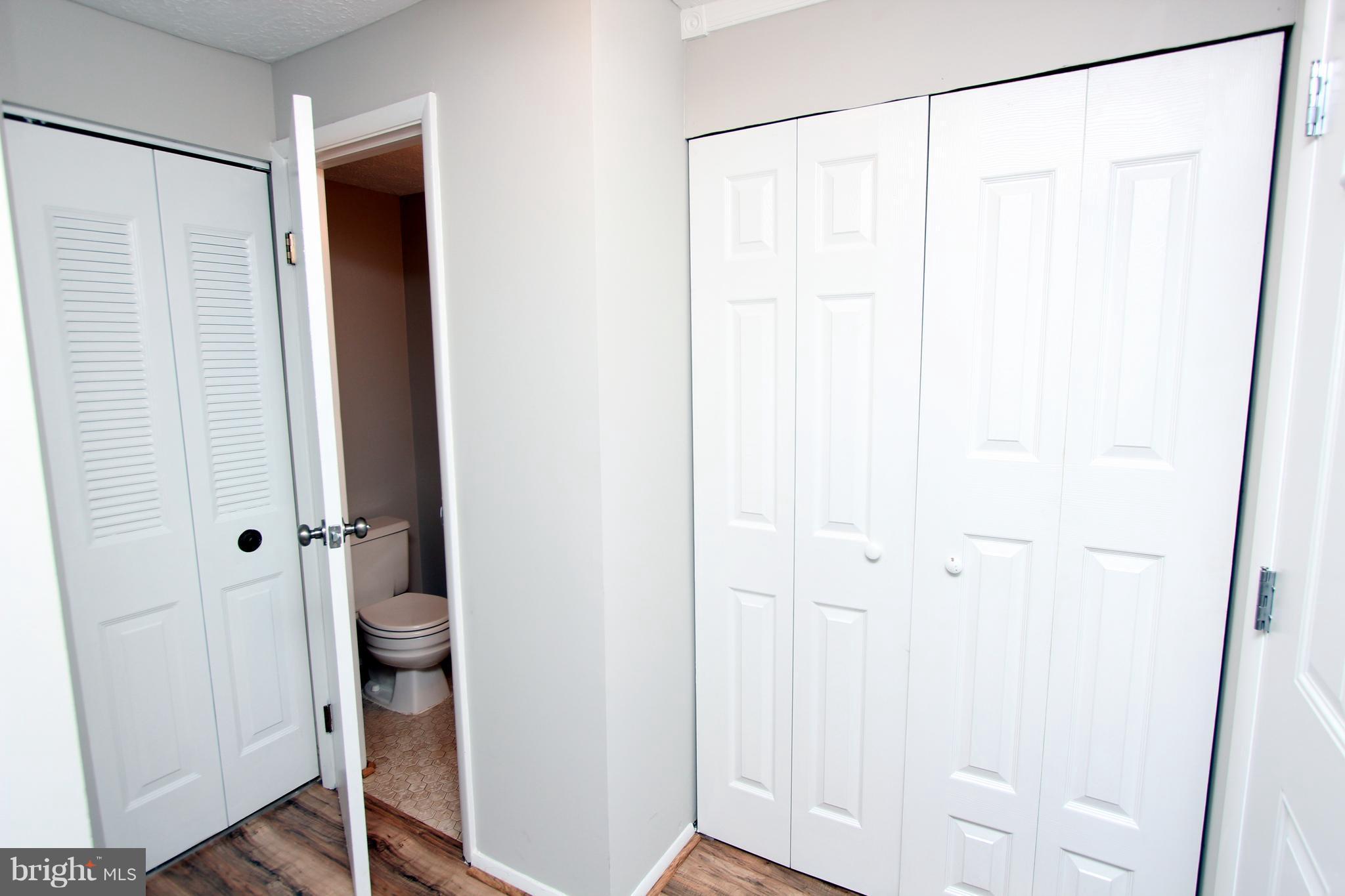8757 Newington Commons Road Lorton, VA 22079 - Photo 4 of 20 a bathroom with a shower