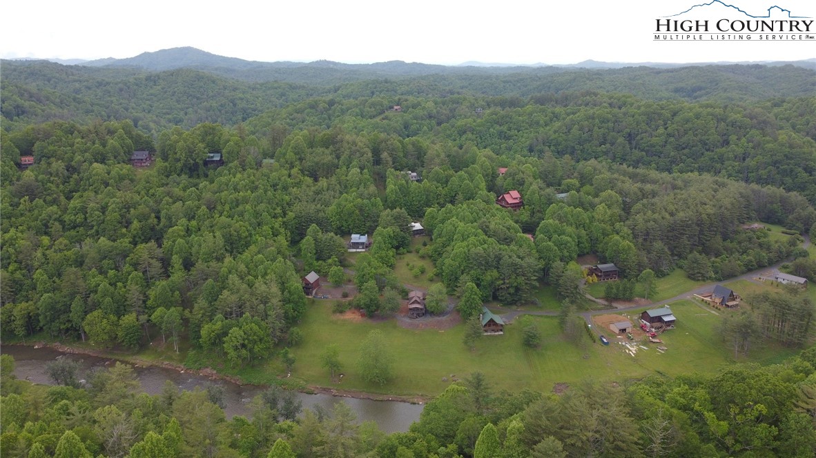 710 River Hills Road Lansing, NC 28643 - Photo 29 of 38 a view of a lush green field
