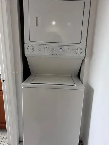 a view of empty room with windows