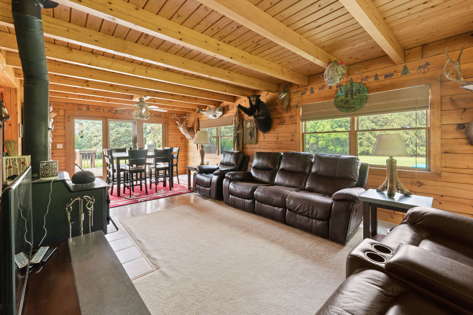 14265 Barber Greene Road Sycamore, IL 60178 - Photo 10 of 38 a living room with furniture and a floor to ceiling window