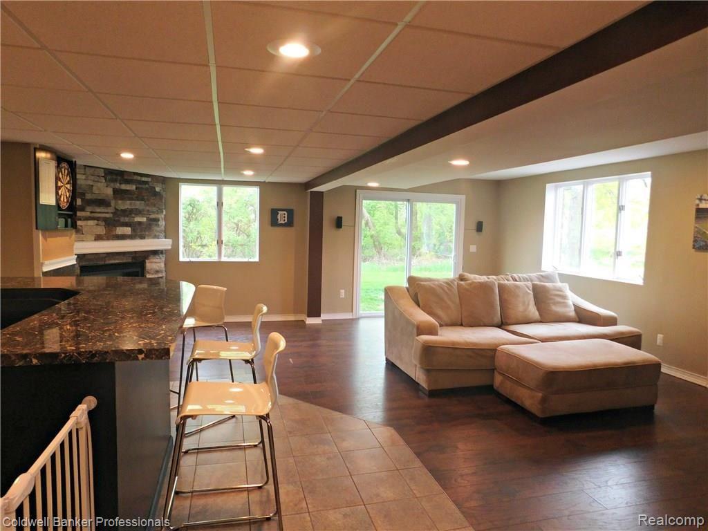 6750 Cuthbert Road White Lake, MI 48386 - Photo 29 of 40 well-finished lower level is perfect for entertaining