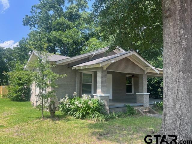 617 West Dobbs Street Tyler, TX 75701 - Photo 2 of 19 a view of a house with a yard