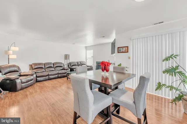 a bathroom with a sink vanity and a mirror