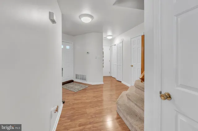 a kitchen with stainless steel appliances granite countertop a stove refrigerator sink and microwave