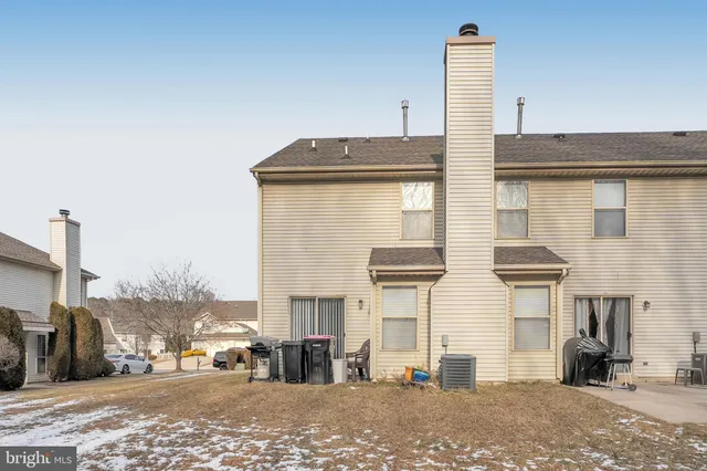 a view of a street with a house