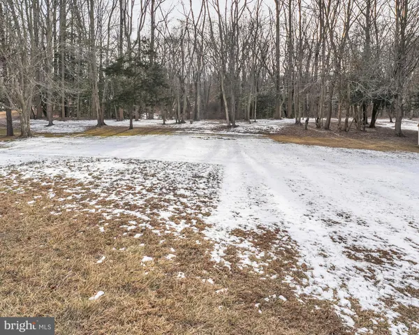 a outdoor space with lots of white furniture