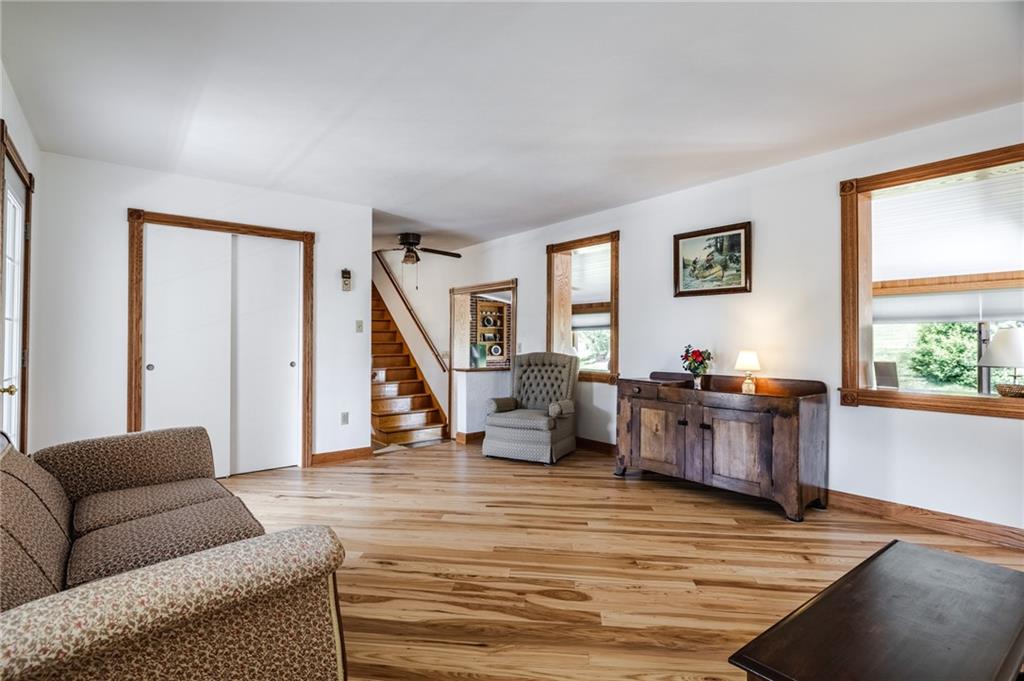 440 Owl Hollow Road Ligonier, PA 15658 - Photo 18 of 49 a living room with furniture and a wooden floor