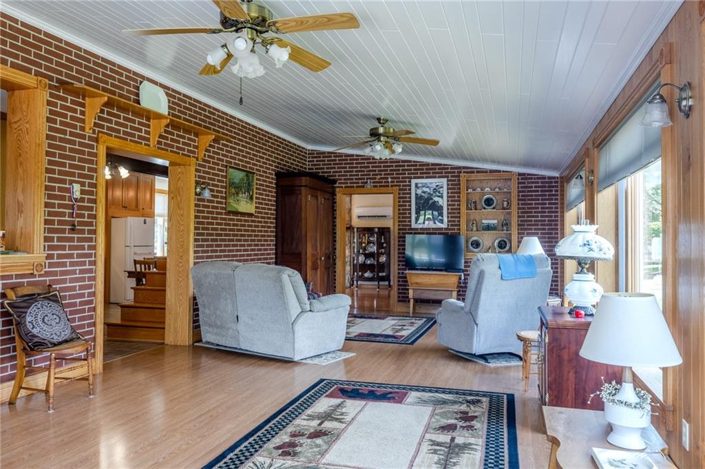 440 Owl Hollow Road Ligonier, PA 15658 - Photo 21 of 49 a living room with furniture and wooden floor