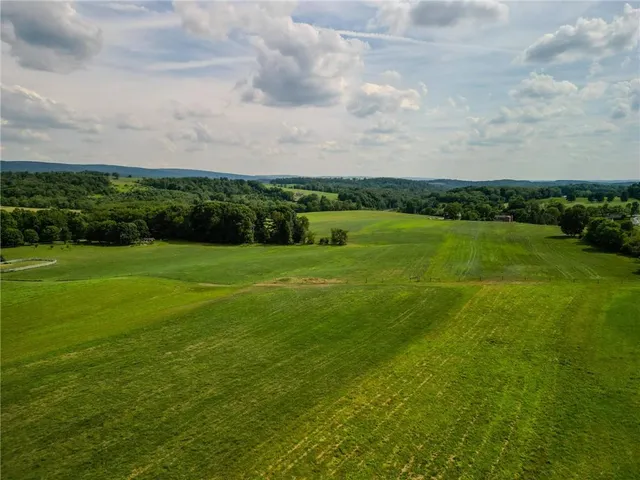a view of a golf course with a lake