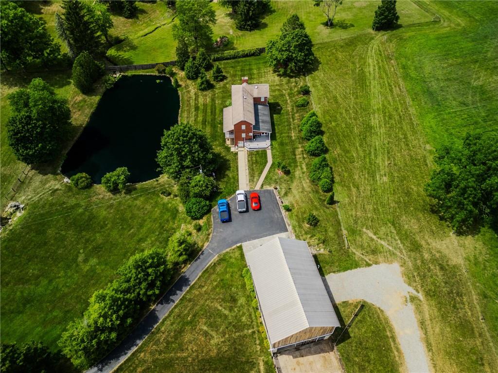 440 Owl Hollow Road Ligonier, PA 15658 - Photo 6 of 49 an aerial view of residential houses with outdoor space