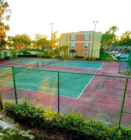 a view of a stadium that has a big playing ground