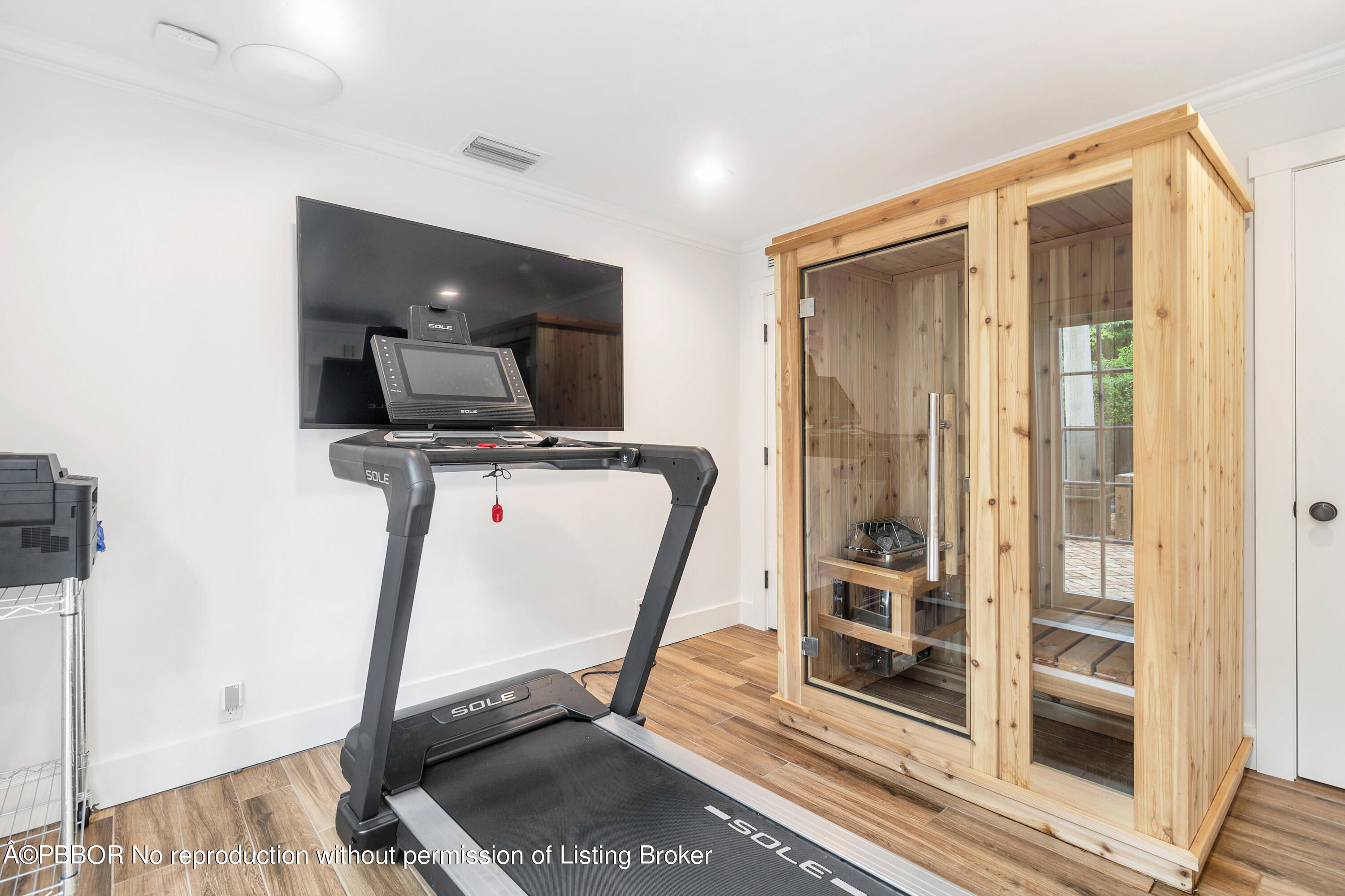 231 Sunset Road West Palm Beach, FL 33401 - Photo 14 of 22 a view of a hallway with wooden floor and windows