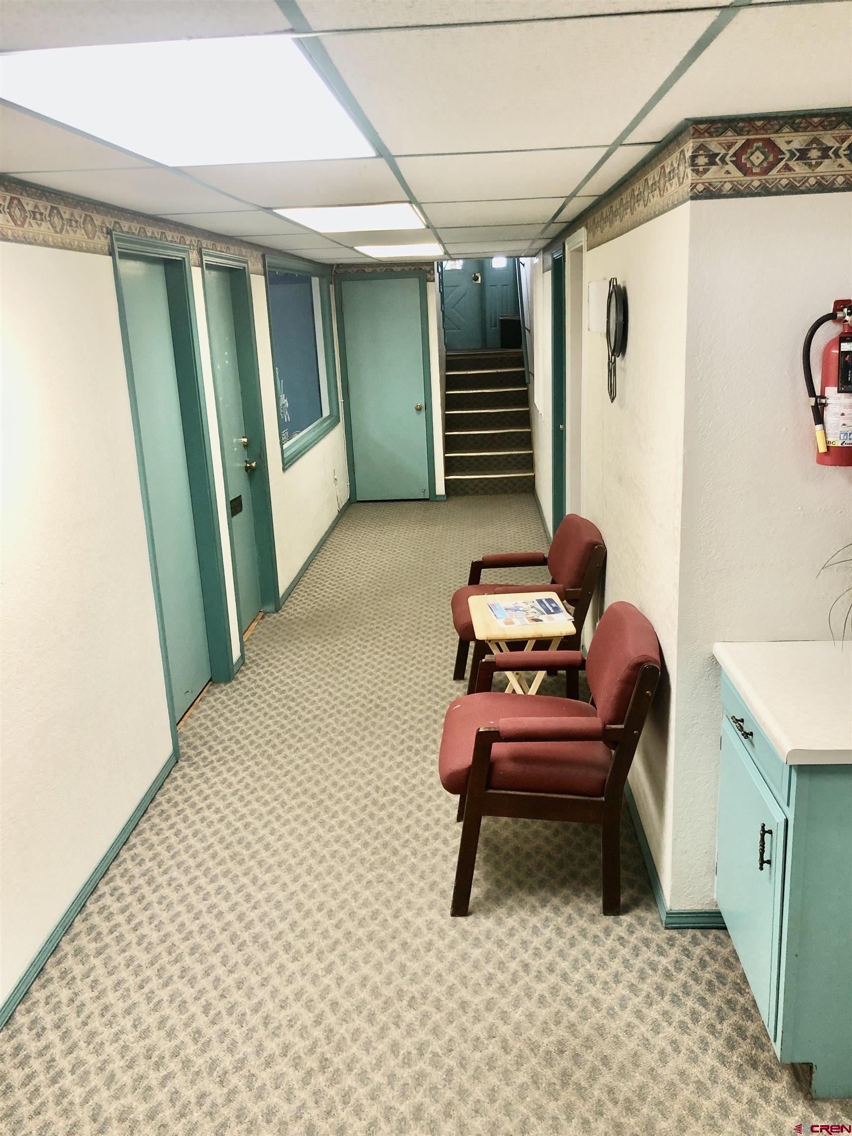 721 Main Street Delta, CO 81416 - Photo 12 of 17 a bedroom with furniture and a window