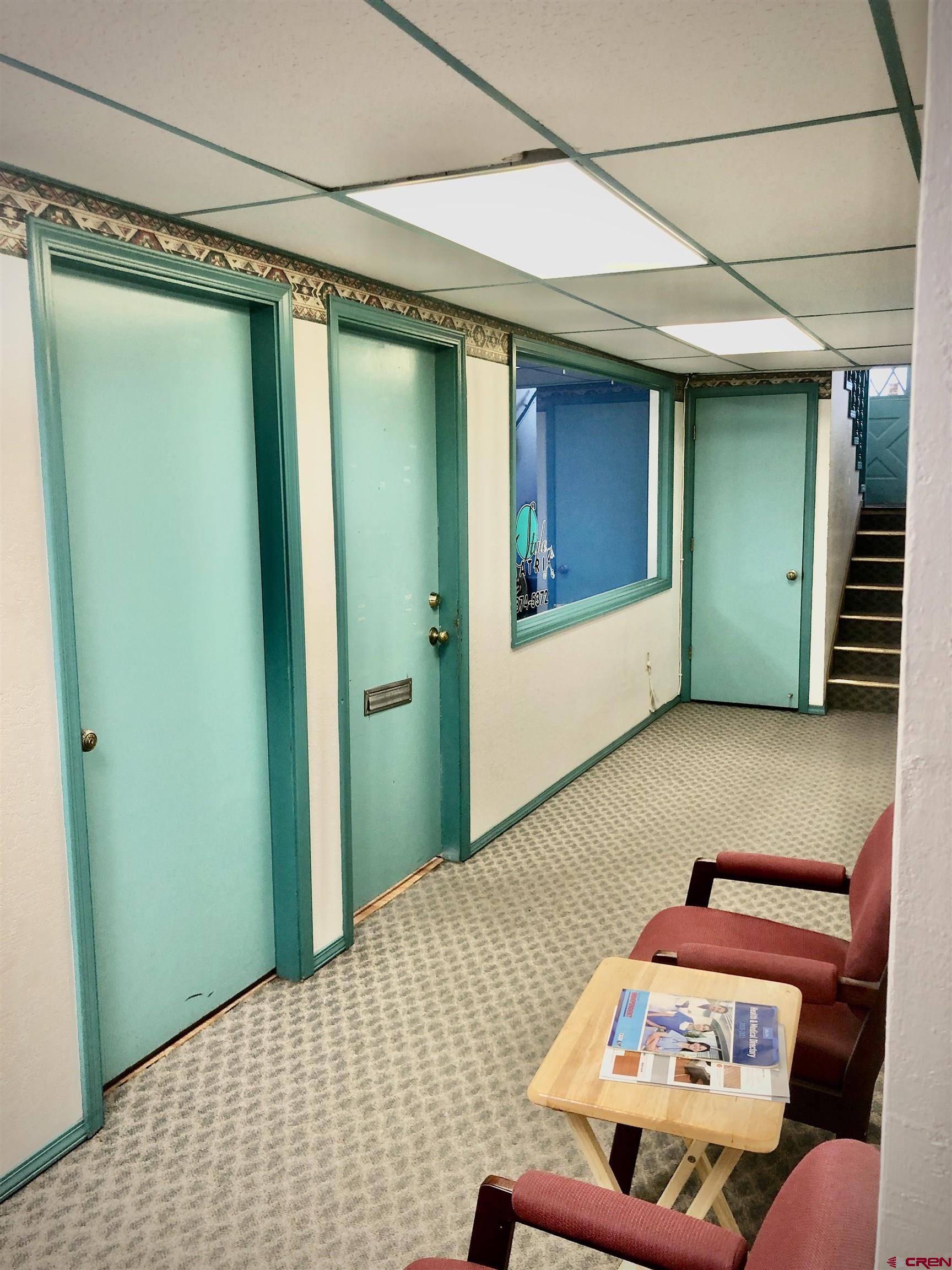 721 Main Street Delta, CO 81416 - Photo 16 of 17 a bedroom with a bed and a window