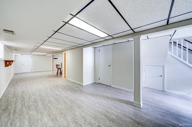 a bathroom with a toilet sink and shower