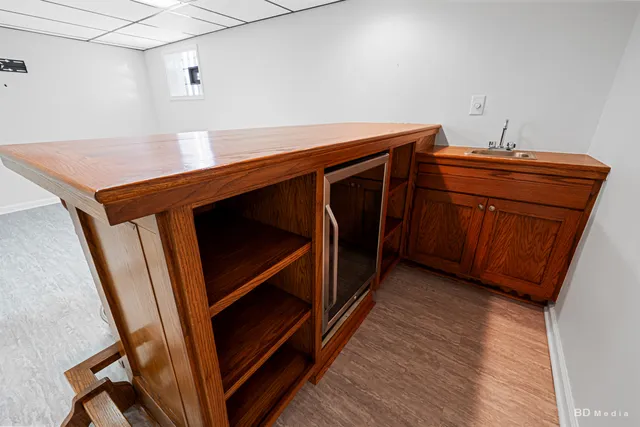 a view of a chairs and table in the front of a house
