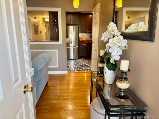 a bathroom with a sink mirror and vanity