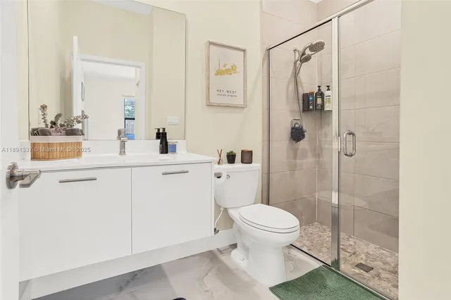 a view of a patio with table and chairs