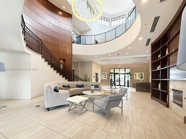 a couple of cars parked in front of a building