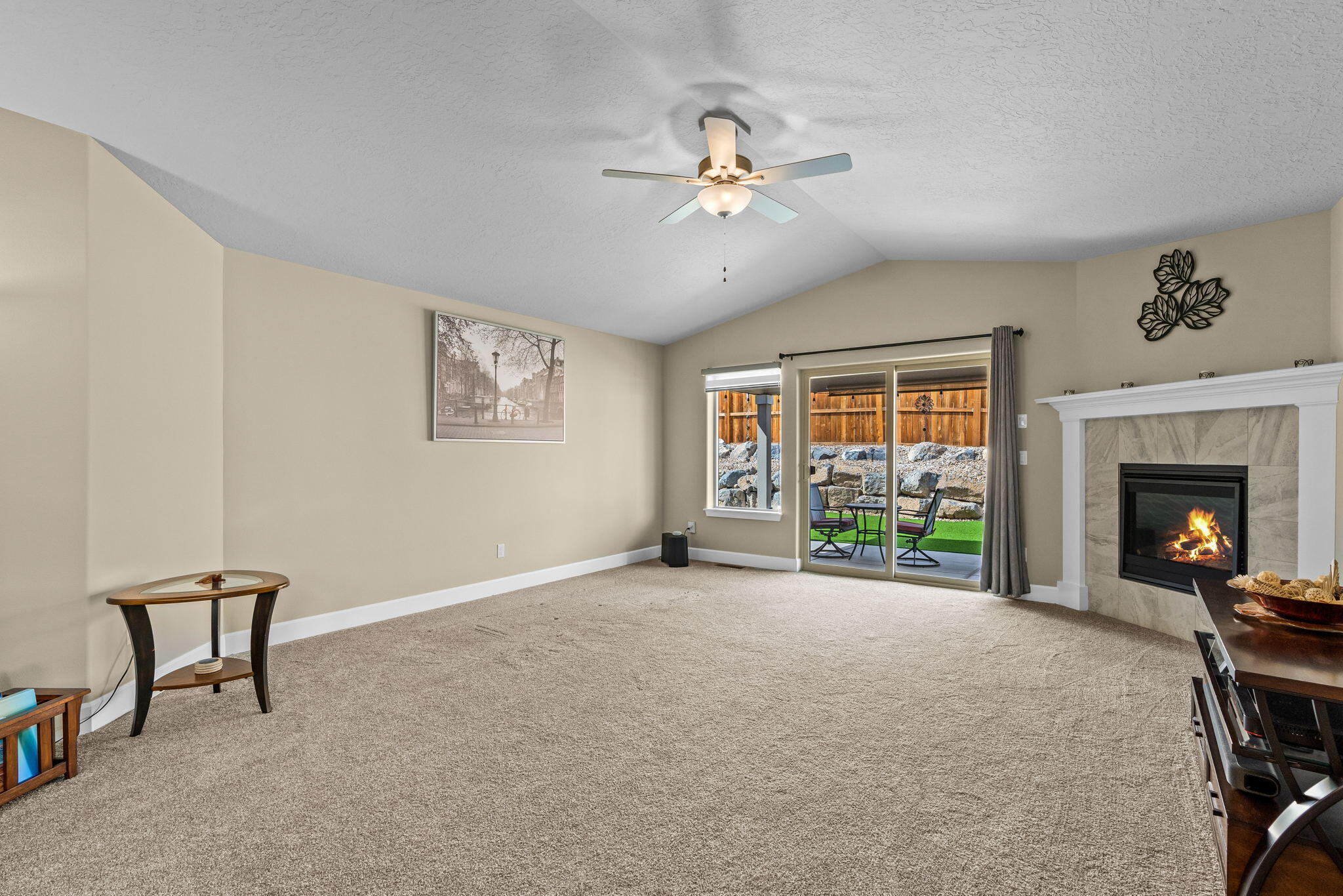 2546 Southwest Newberry Loop Redmond, OR 97756 - Photo 12 of 35 Vaulted Living Room opens to the covered back patio area.