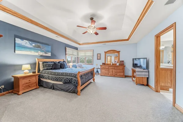 a bedroom with furniture and window
