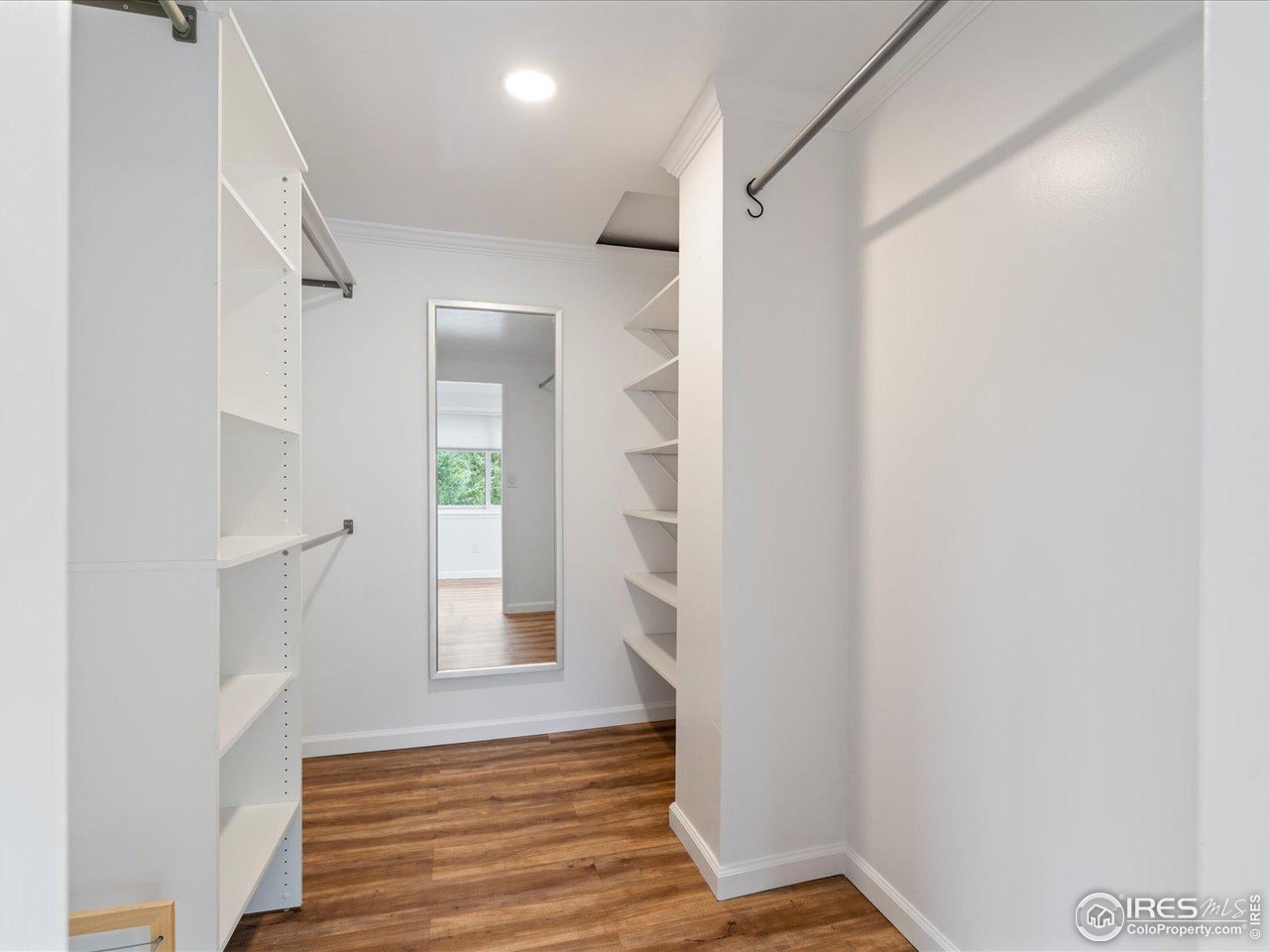 31851 Warrens Road Golden, CO 80403 - Photo 20 of 40 a view of entryway with wooden floor