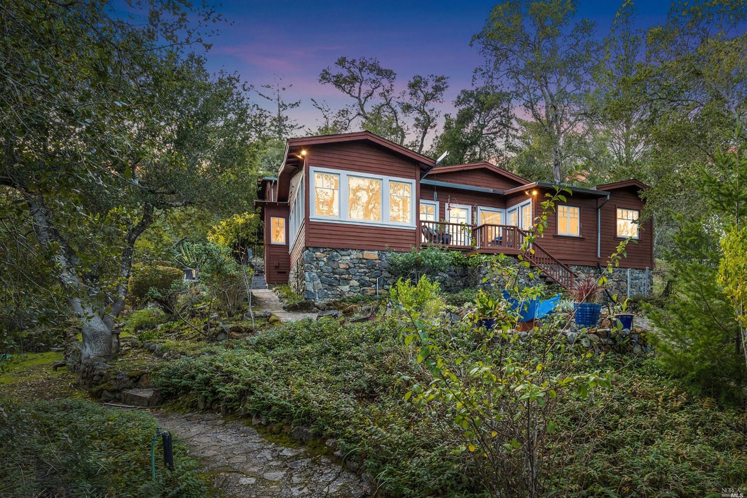 29 Rock Ridge Road Woodacre, CA 94973 - Photo 1 of 1 a house that has a tree in front of it