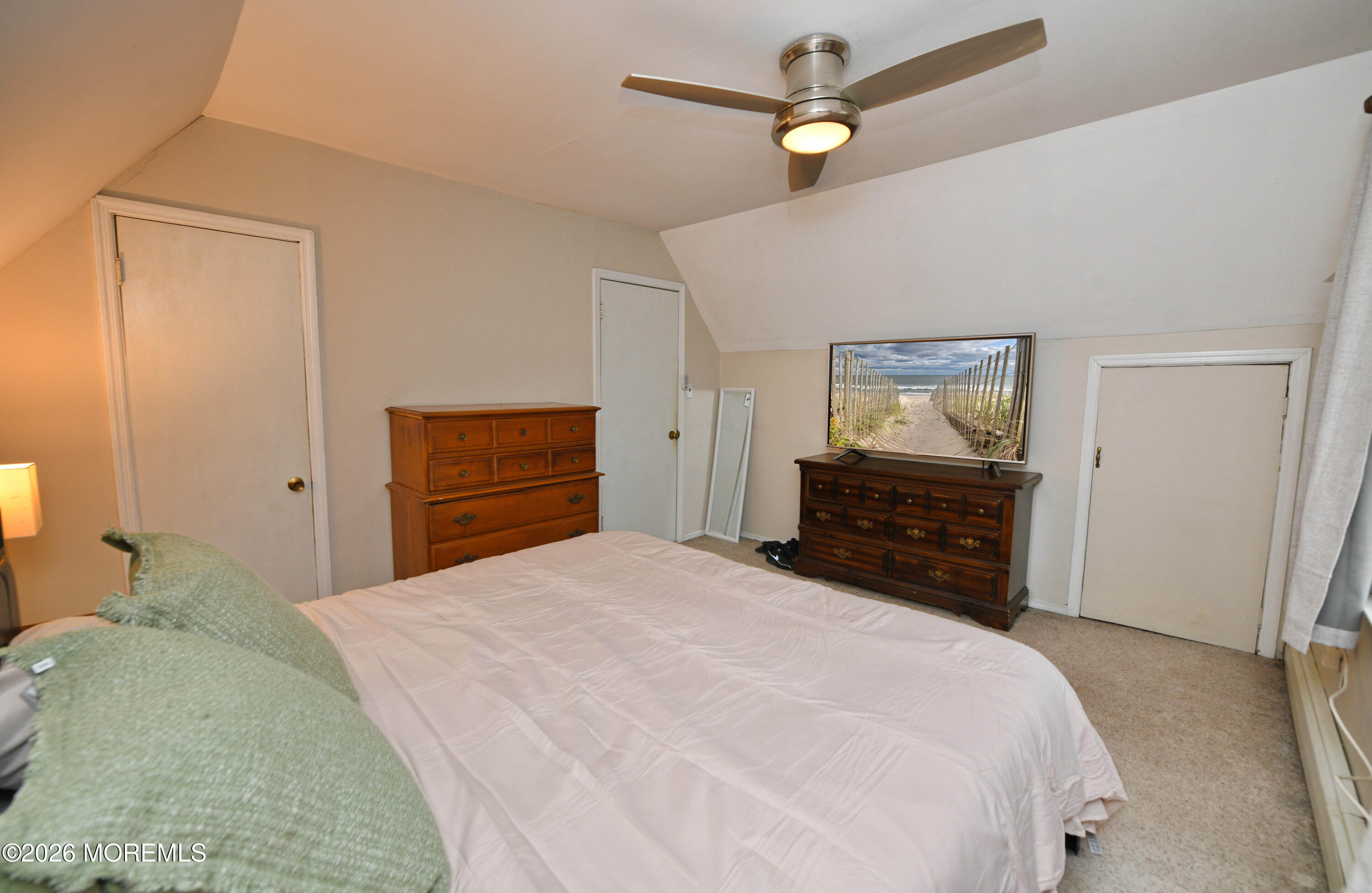232 Pearce Avenue Point Pleasant, NJ 08742 - Photo 15 of 27 a bedroom with a bed and a dresser