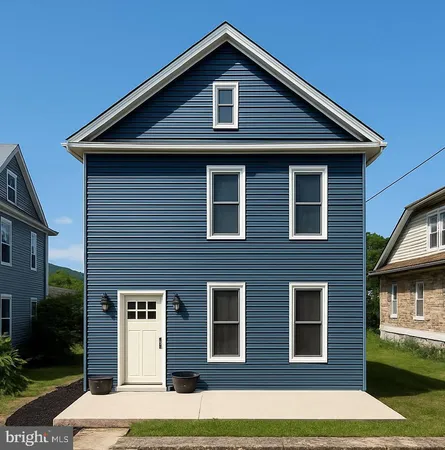 a front view of a house with garage