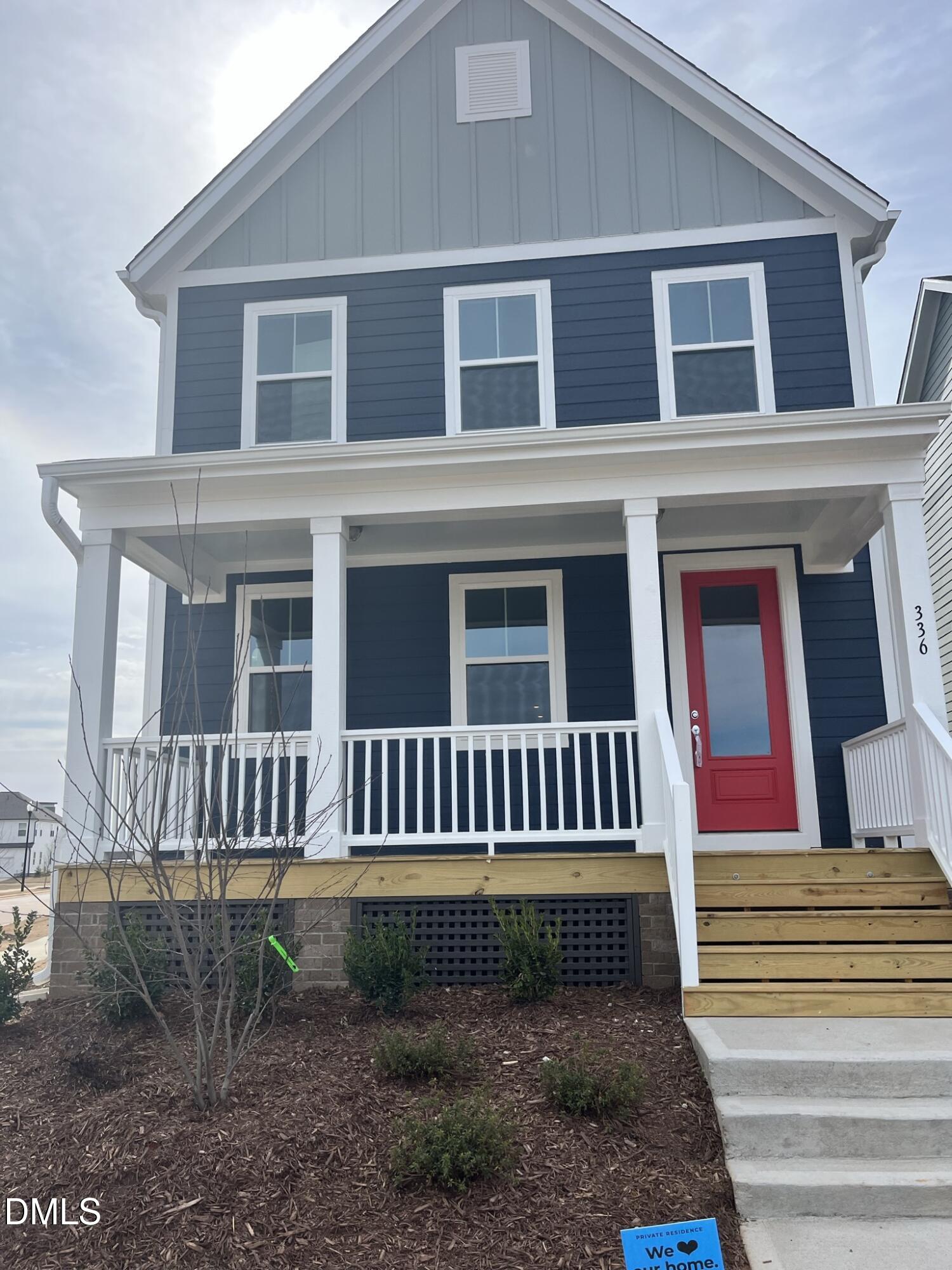 a front view of a house with a porch