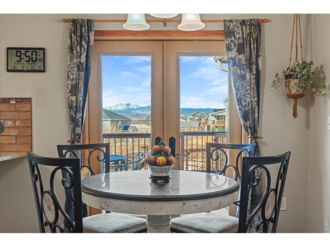 537 South 9th Street Berthoud, CO 80513 - Photo 14 of 47 a view of a dining room with furniture window and outside view