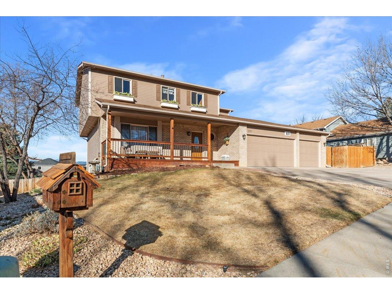 537 South 9th Street Berthoud, CO 80513 - Photo 2 of 47 a house view with a backyard space