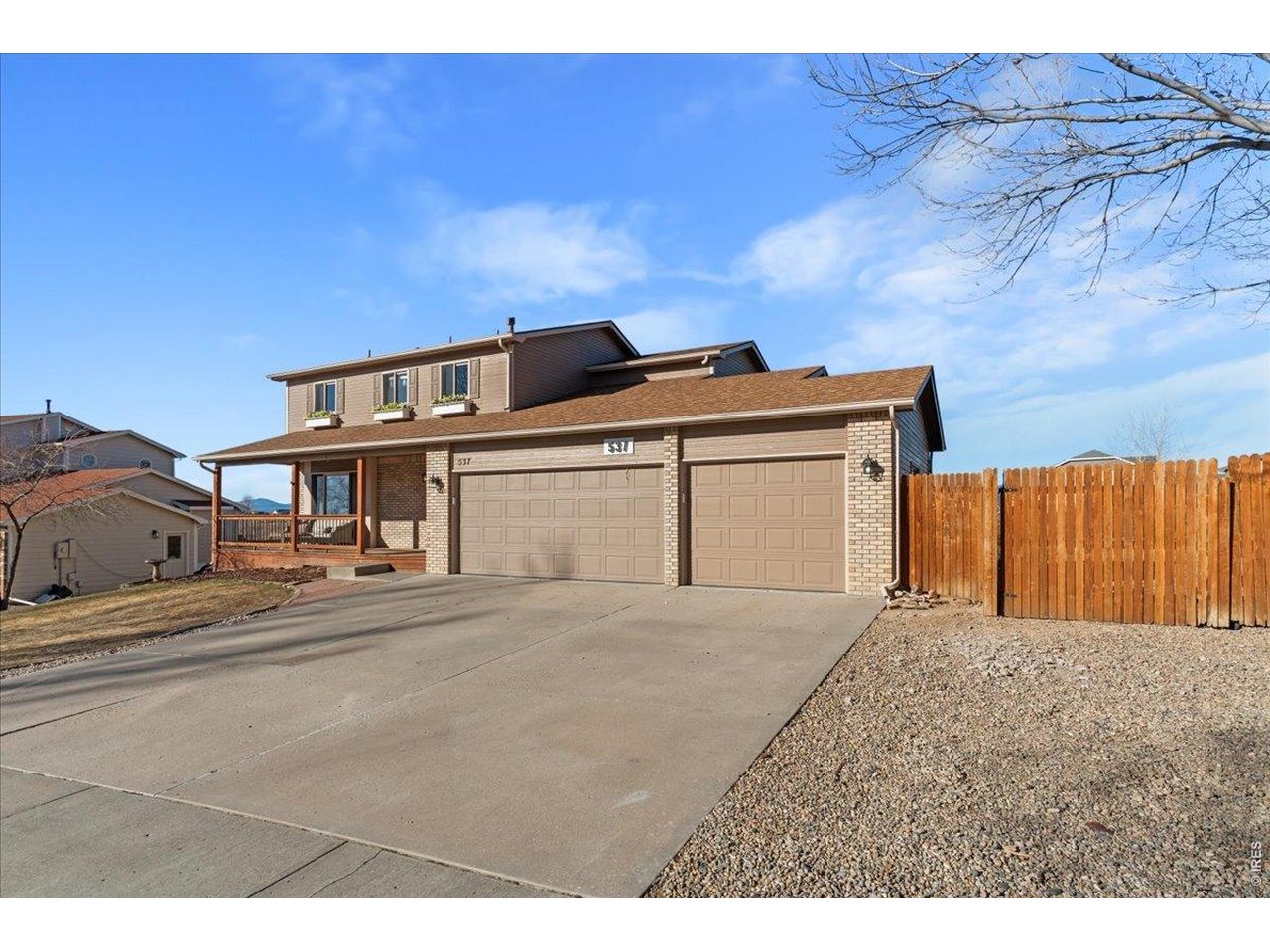 537 South 9th Street Berthoud, CO 80513 - Photo 3 of 47 a front view of a house with a yard