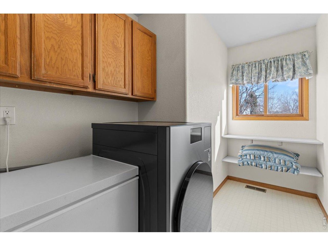 537 South 9th Street Berthoud, CO 80513 - Photo 32 of 47 a utility room with dryer and washer