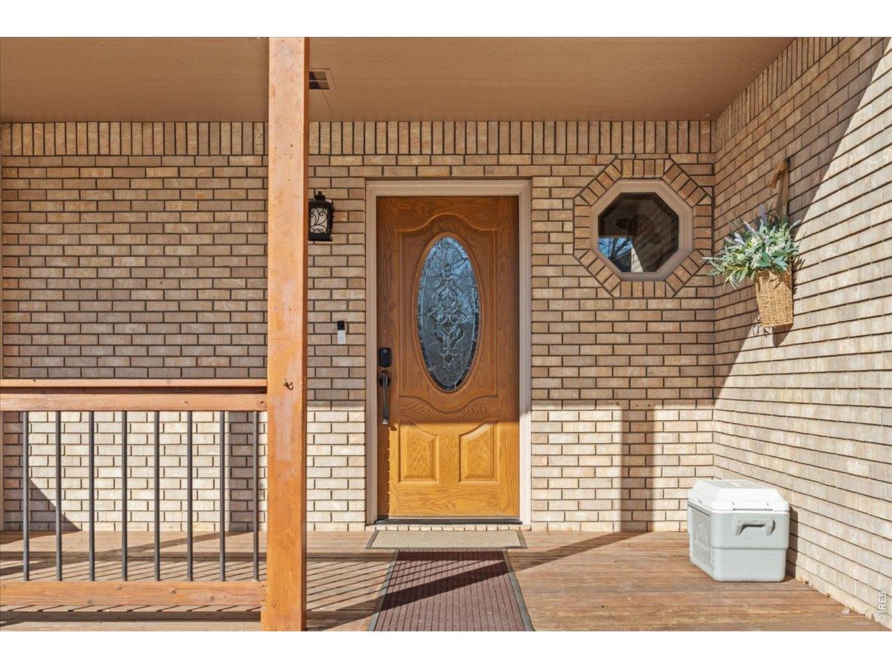 537 South 9th Street Berthoud, CO 80513 - Photo 4 of 47 a view of door with wooden floor