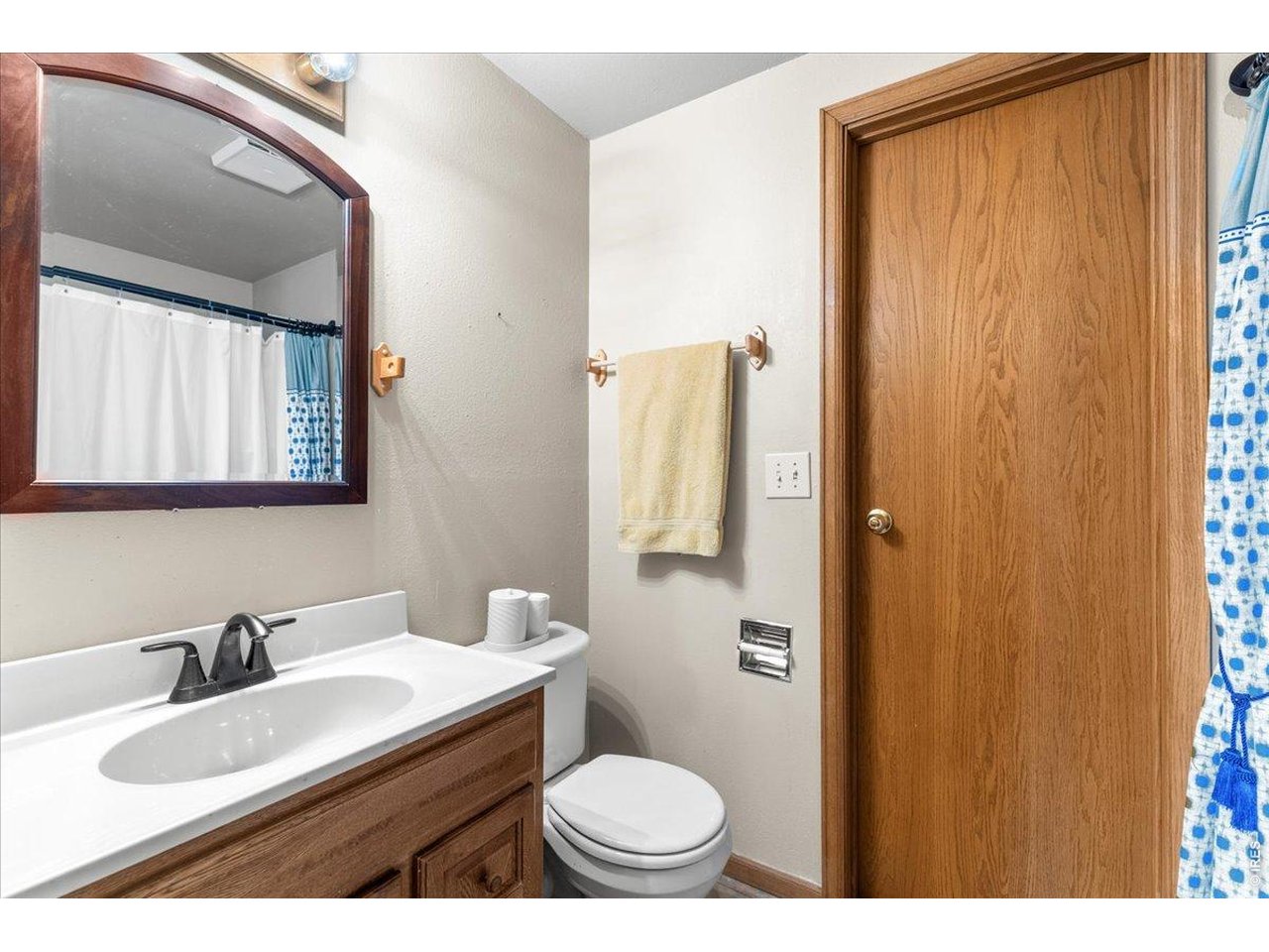 537 South 9th Street Berthoud, CO 80513 - Photo 42 of 47 a bathroom with a sink a toilet and mirror