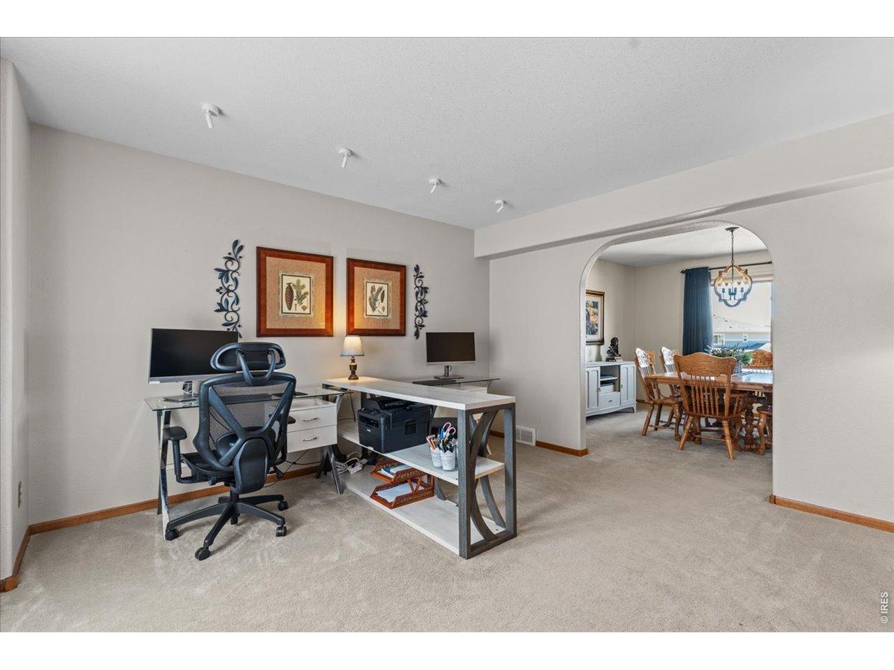 537 South 9th Street Berthoud, CO 80513 - Photo 8 of 47 a view of a workspace with furniture and a window